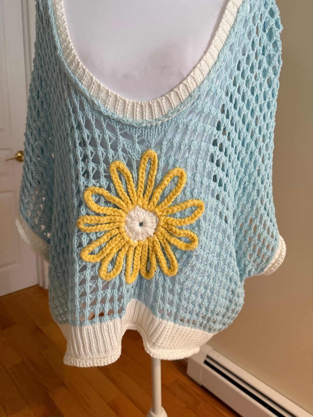 Light Blue Off-Shoulder Crochet Sweater Top with Yellow Daisy